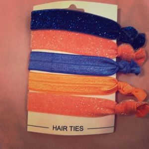 10 orange, blue and white hair ties